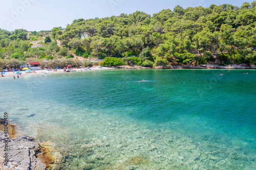 Picturesque pebble Zastup beach nearby Splitska which is situated on the north coast of Brac island in Croatia.