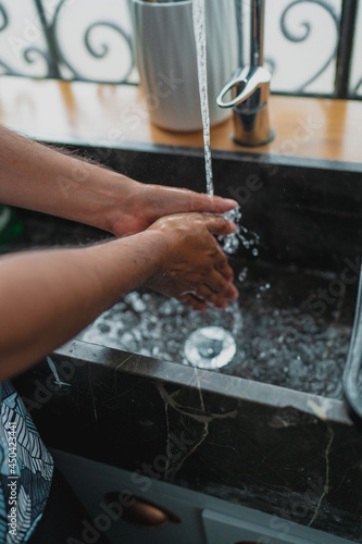 washing hands with water and soap