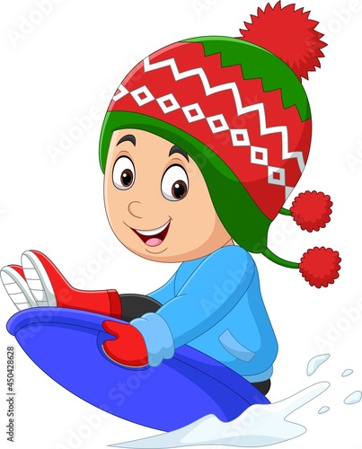 Cartoon little boy sledding down a hill