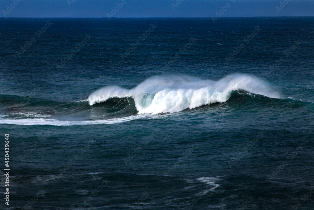 waves crashing at sea