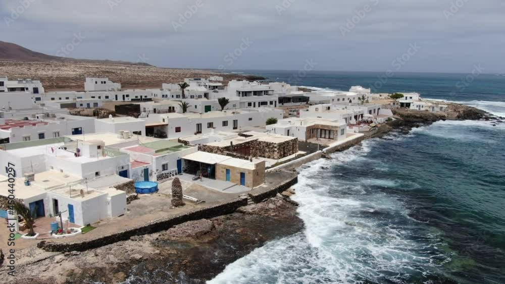 Drone view of La Graciosa harbour near island of Lanzarote, Canary islands, Spain. Drone view of La Graciosa harbour near island of Lanzarote, Canary islands, Spain.