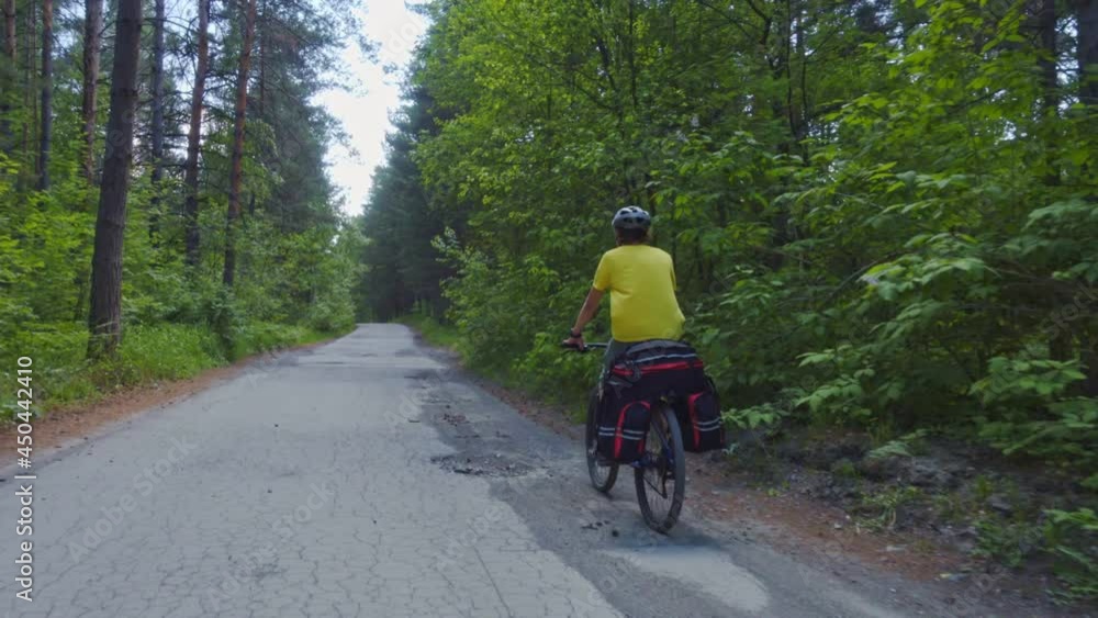 Two teenagers travel on bicycles Two teenagers travel on bicycles