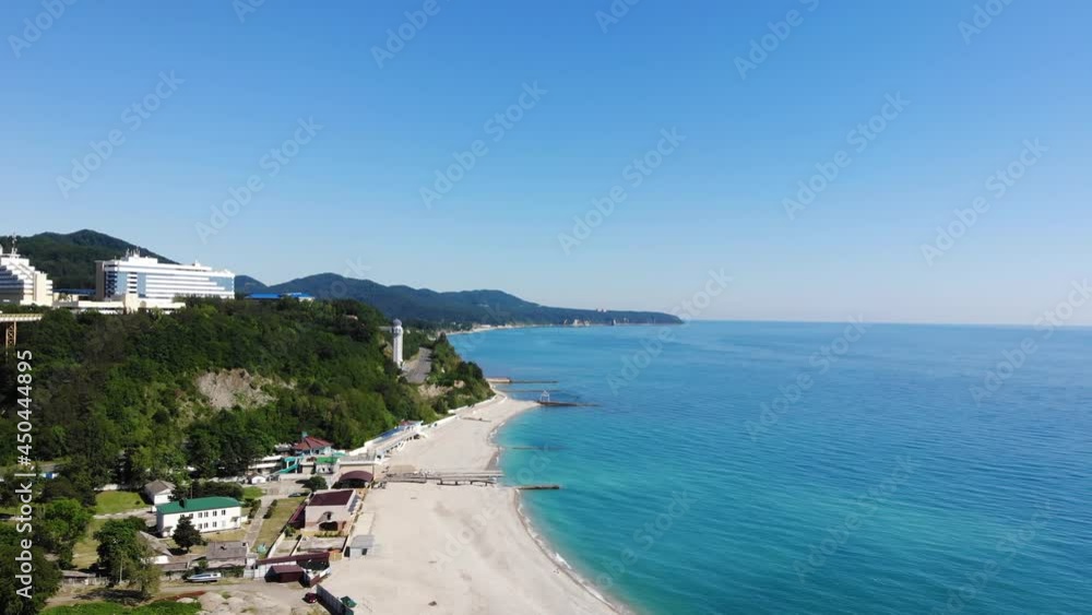 Aerial video shooting from a drone. View of the Sochi. City beach where people relax.	