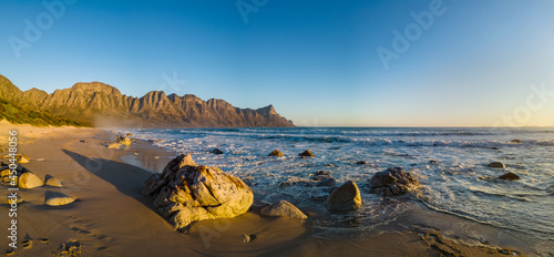 View of the Kogelberg Mountains from Kogelberg beach along Clarence Drive between Gordon's Bay and Rooi-Els. False Bay. Western Cape. South Africa photo