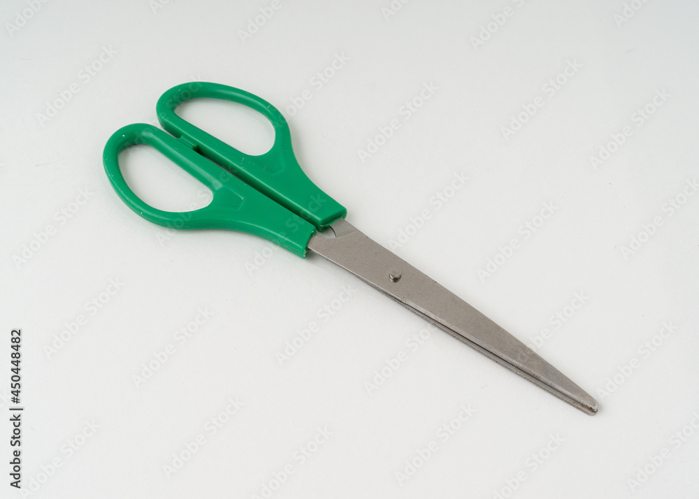 A scissors isolated on white background. A scissors isolated on white background.