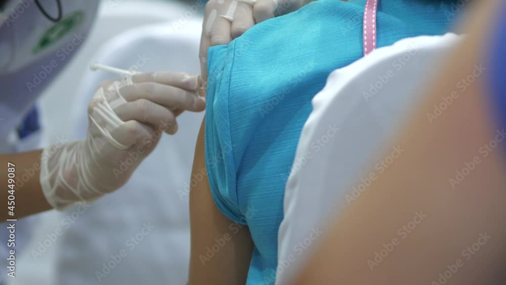 Medical Nurse Making a Vaccine Injection to Patient. Doctor Uses ...