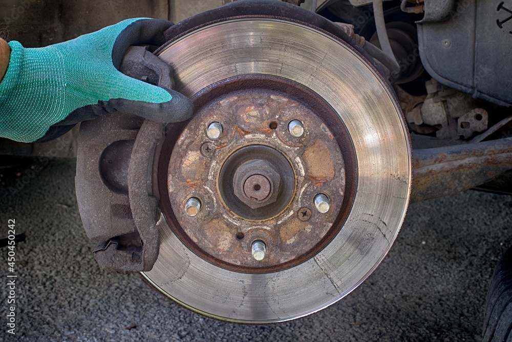 Car disk brake pad replacement service with hand Car disk brake pad replacement service with hand