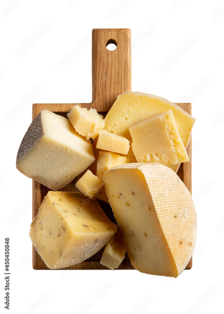 Various types of cheese on wooden  tray isolated on white. Cheese plate. Top view.