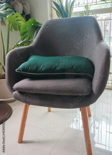 close up fabric grey chair in living room at modern house © jummie