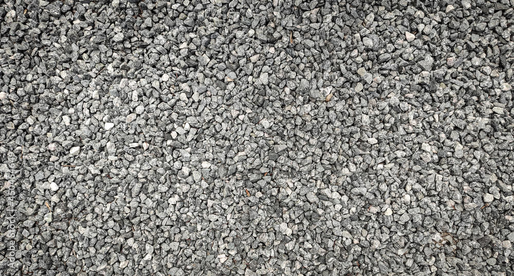 texture of gravel stones on ground background texture of gravel stones on ground background