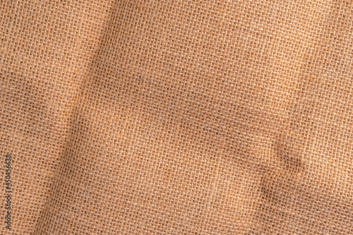 Textured folded rustic sackcloth with wrinkles