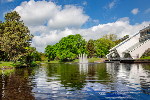 Panorama of the Riga canal against the background of beautiful Kronvalda park on summer day in Riga, Latvia.	
 photo