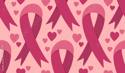 Seamless pattern with pink ribbon - breast cancer awareness symbol and hearts. Vector background. Backdrop texture for health care medical concept