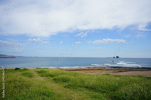 a beautiful seascape with an island