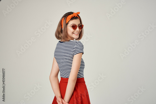 pretty woman wearing sunglasses modern style and summer fashion posing © SHOTPRIME STUDIO