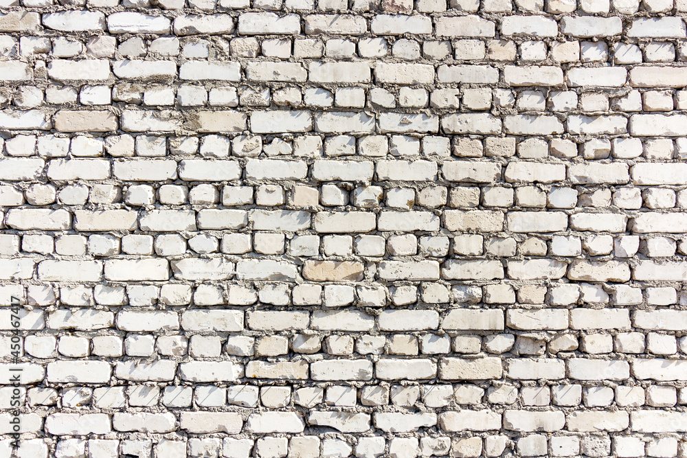 Obraz premium White rough brick wall is used in construction