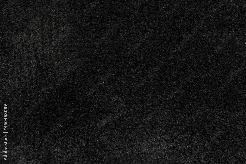 Black wool seamless texture background. dark texture with short factory wool