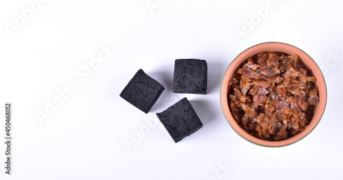 Hookah bowls with tobacco and charcoal for smoking on a white background. Space for text. Banner
