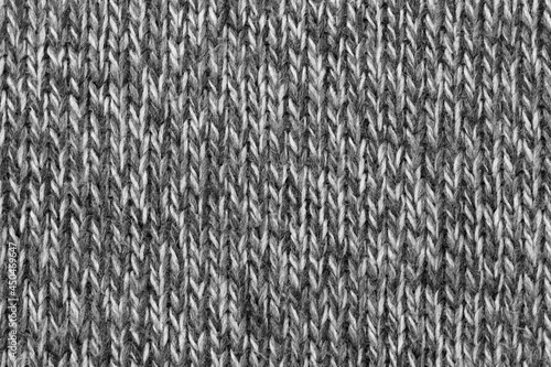Seamless texture of knitted sweaters background. factory material texture