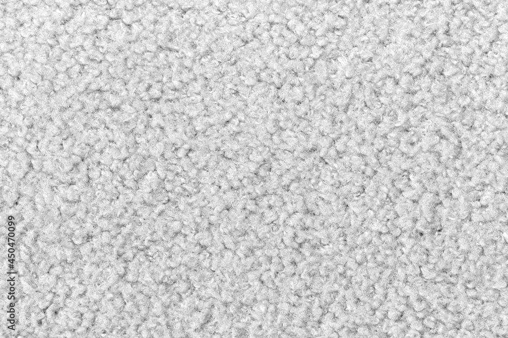 White curly wool seamless texture background. texture with short factory material.