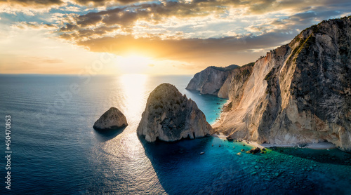 Panoramic aerial view to the beautiful Mizithres rocks and beaches at the west coast of Zakynthos island, Greece, during a colorful summer sunset