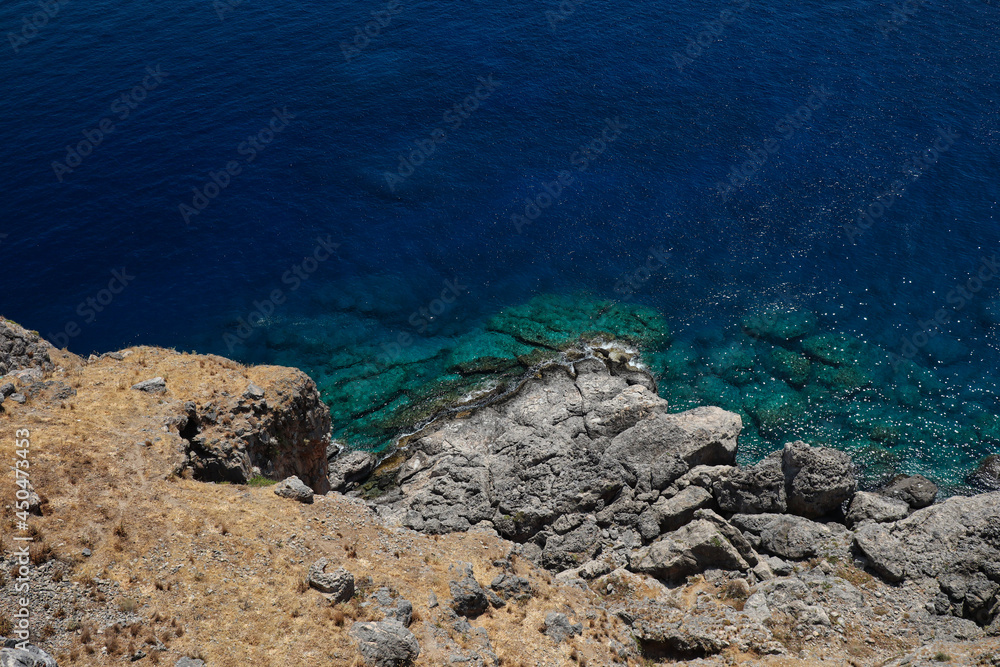 Top-Down of Beautiful Clear Water in Greece. Above View of Aegean Sea and Rock in Rhodes. 