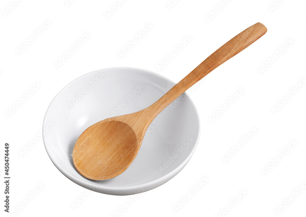 wooden spoon in ceramic cup on white background wooden spoon in ceramic cup on white background