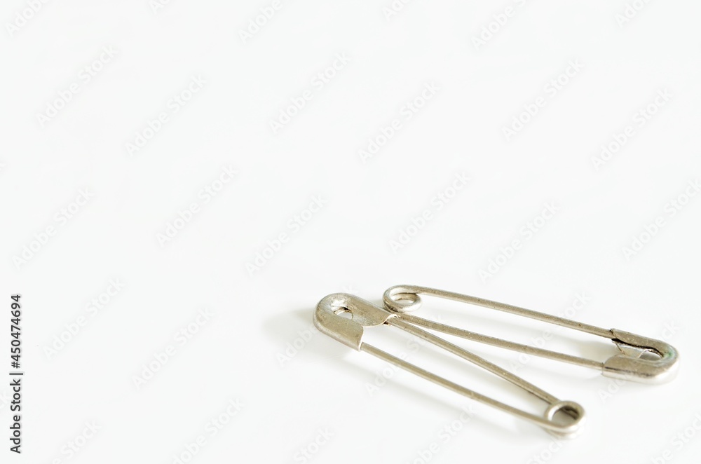 safety pin on white background