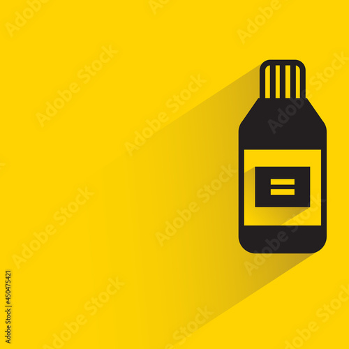 bottle with shadow on yellow background