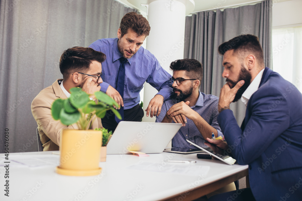 Fototapeta premium Businesspeople discussing together in conference room during meeting at office
