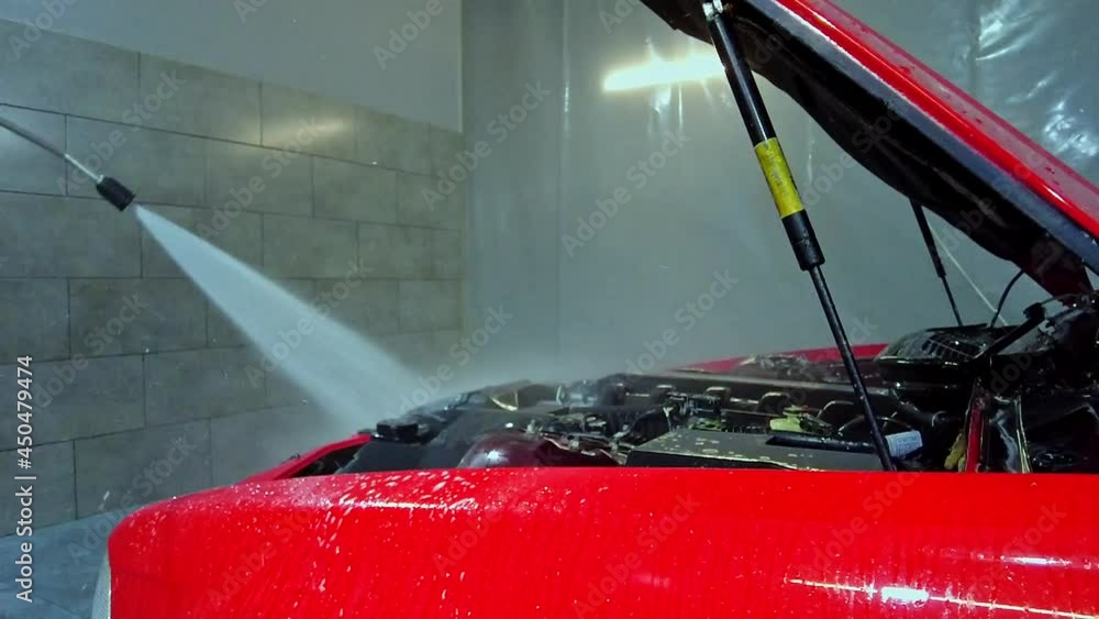 Slow motion movie. Cleaning the engine bay. Car cleaning and car