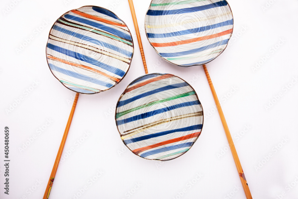 Japanese dishes on white background