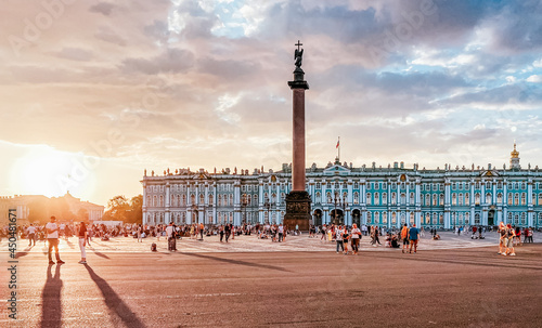 summer sunset on the palace square near the winter palace photo