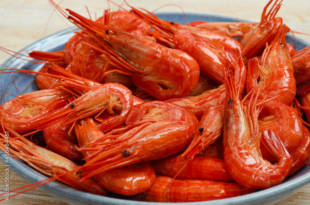 tiger shrimp on a ceramic plate, seafood and gourmet food tiger shrimp on a ceramic plate, seafood and gourmet food
