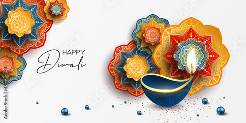 Happy Diwali. Paper Graphic of Indian Rangoli. Rangoli - A traditional Indian art of decorating the entrance to a house. Diwali festival holiday design with paper cut style of Indian Rangoli. 