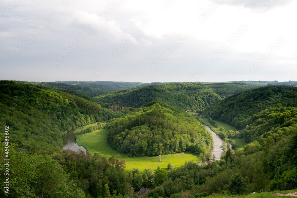 River and green hills of Belgium