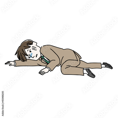 倒れているスーツの男性