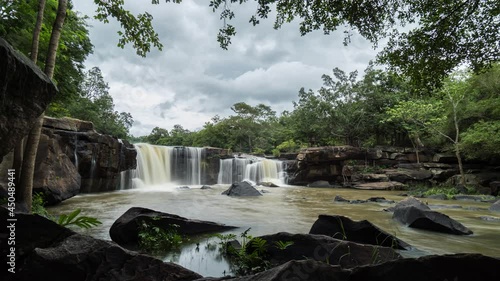 Footage B roll timelapse of Tat Ton Waterfall in Chaiyaphum Province, Thailand. Time lapse waterfall and cloud sky. photo