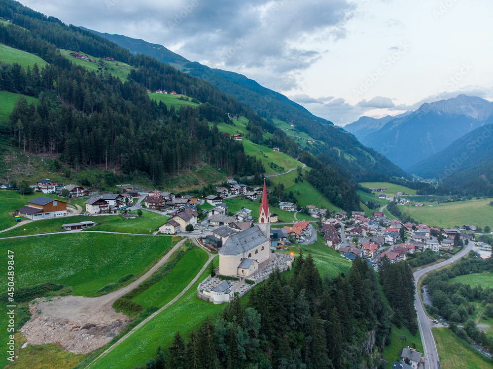 Austrian church seen from the side with lake and valley behind Austrian church seen from the side with lake and valley behind