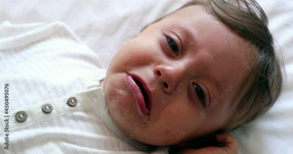 Tearful baby toddler crying. One year told child cries Tearful baby toddler crying. One year told child cries