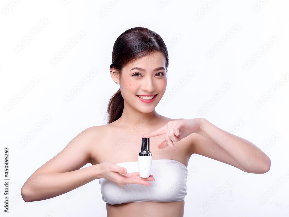 Portrait of beautiful charming young Asian woman posing facial with cosmetic bottle, beauty of female face with skincare on white background, healthcare and skin care concept. Portrait of beautiful charming young Asian woman posing facial with cosmetic bottle, beauty of female face with skincare on white background, healthcare and skin care concept.