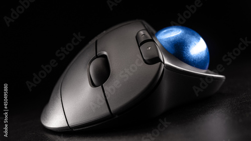 Wireless Trackball Computer mouse on a black background photo