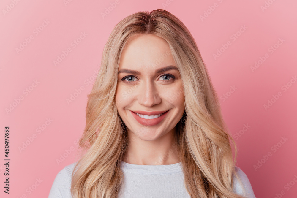 Fototapeta premium Portrait of charming lovely pretty lady look camera toothy beaming smile on pink background