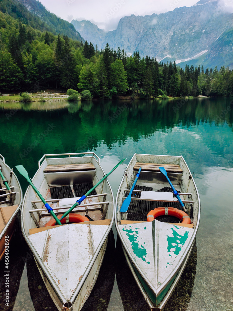 Boats on a mountain lake with a beautiful landscape.