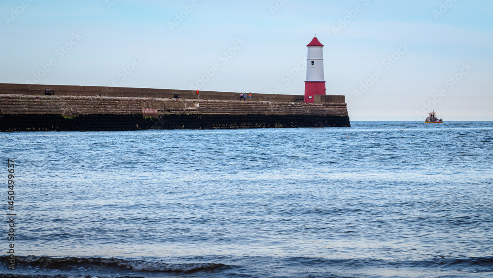 Berwick Pier and Lighthouse.  Berwick upon Tweed is the most northerly town in England and is located in Northumberland at the mouth of the River Tweed just below the Scottish border