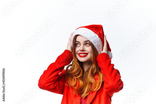 woman wearing santa hat emotion home close-up decoration
