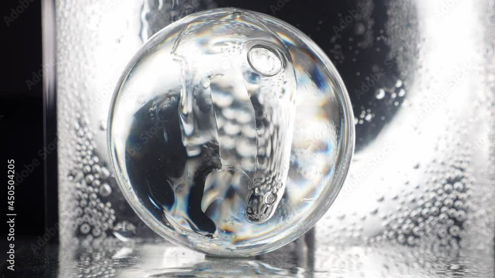 Oxygen bubbles in clear transparent water with hyaluronic acid or ...
