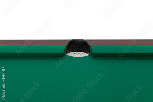 A pool table. Parts of a billiard table close-up. American pool table. Billiard pockets. Wooden billiard table.