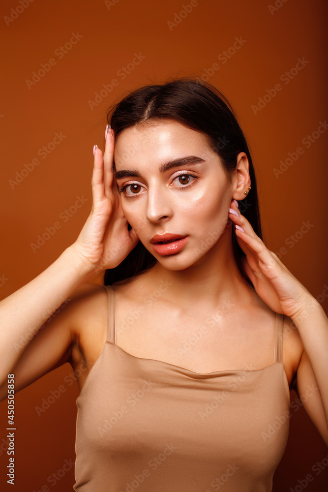 cute happy young indian woman posing cheerful on brown background in studio close up smiling, fashion beauty cute happy young indian woman posing cheerful on brown background in studio close up smiling, fashion beauty