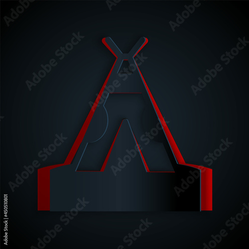 Paper cut Traditional indian teepee or wigwam icon isolated on black background. Indian tent. Paper art style. Vector